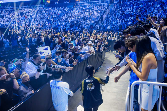 ATLANTA, GEORGIA - OCTOBER 30: Cho "Beryl'' Geon-hee of Gen.G (L) and Son "Lehends" Si-woo of DRX make a grand entrance at the League of Legends World Championship Semifinals on October 30, 2022 in Atlanta, GA.
